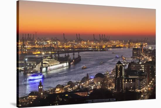 View over St. Pauli district and St. Pauli Landungsbruecken pier over the harbour at sunset, Hambur-Markus Lange-Stretched Canvas