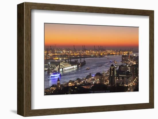 View over St. Pauli district and St. Pauli Landungsbruecken pier over the harbour at sunset, Hambur-Markus Lange-Framed Photographic Print