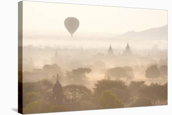 View over the Temples of Bagan Swathed in Early Morning Mist-Lee Frost-Stretched Canvas