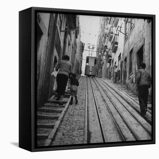 View Showing a Typical Street Scene in Lisbon-Bernard Hoffman-Framed Stretched Canvas