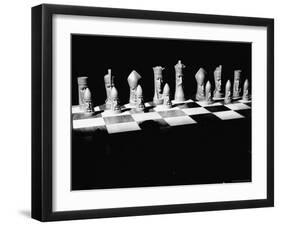 View Showing Chess Pieces with Faces Carved Into Them-David Scherman-Framed Photographic Print