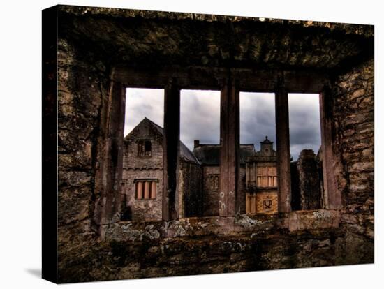 View Through a Stone Window of Ruined Castle-Clive Nolan-Stretched Canvas