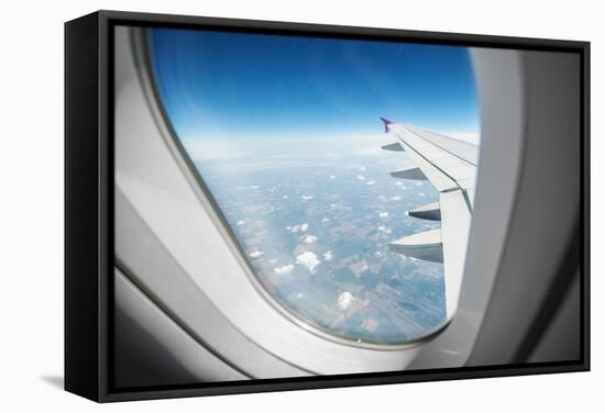 View Through Airplane Window-mr. Smith-Framed Stretched Canvas