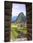 View Through Window of Ancient Lost City of Inca, Machu Picchu, Peru, South America with Llamas-Miva Stock-Stretched Canvas