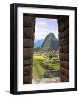 View Through Window of Ancient Lost City of Inca, Machu Picchu, Peru, South America with Llamas-Miva Stock-Framed Photographic Print