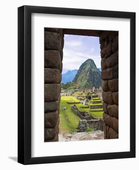 View Through Window of Ancient Lost City of Inca, Machu Picchu, Peru, South America with Llamas-Miva Stock-Framed Photographic Print