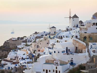 https://imgc.allpostersimages.com/img/posters/village-of-oia-santorini-thira-cyclades-islands-aegean-sea-greek-islands-greece-europe_u-L-PFOBLT0.jpg?artPerspective=n