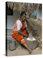Village Woman Pounding Rice, Tamil Nadu, India-Occidor Ltd-Stretched Canvas