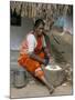 Village Woman Pounding Rice, Tamil Nadu, India-Occidor Ltd-Mounted Photographic Print