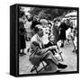 Vincente Minnelli with coffee sitting in chair with Daughter Liza at Outdoor Children's Party Being-J^ R^ Eyerman-Framed Stretched Canvas