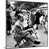 Vincente Minnelli with coffee sitting in chair with Daughter Liza at Outdoor Children's Party Being-J^ R^ Eyerman-Mounted Premium Photographic Print