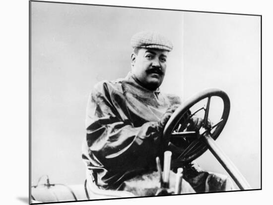 Vincenzo Lancia at the Wheel of a Car-null-Mounted Photographic Print