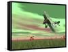 Vintage Biplane Flying Above Green Grass with Flowers by Sunset-null-Framed Stretched Canvas