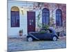 Vintage car on the cobblestone lane of the historic quarter, Colonia del Sacramento, Colonia Depart-Karol Kozlowski-Mounted Photographic Print