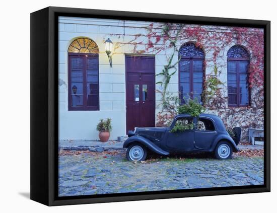 Vintage car on the cobblestone lane of the historic quarter, Colonia del Sacramento, Colonia Depart-Karol Kozlowski-Framed Stretched Canvas