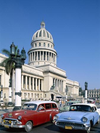 https://imgc.allpostersimages.com/img/posters/vintage-cars-and-capitol-building-havana-cuba_u-L-P362N50.jpg?artPerspective=n