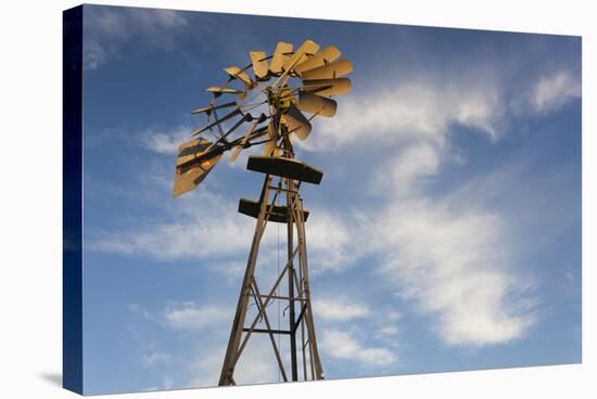 Vintage Farm Windmills at Sunset, Elk City, Oklahoma, USA-Walter Bibikow-Stretched Canvas