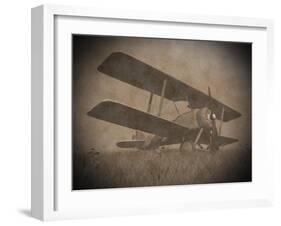 Vintage Image of a Biplane Parked on the Grass-null-Framed Art Print