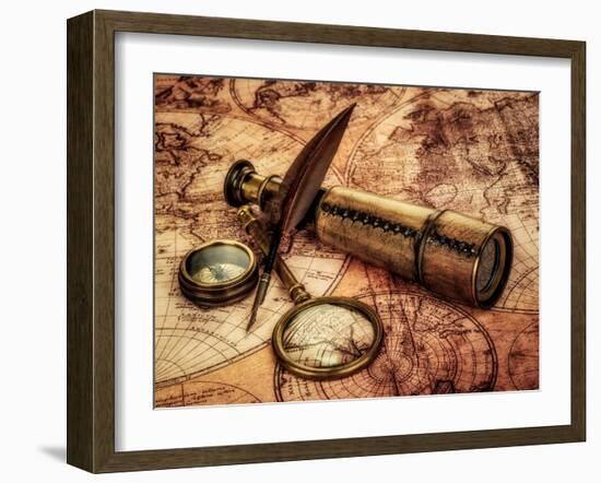 Vintage Magnifying Glass, Compass, Goose Quill Pen And Spyglass Lying On An Old Map-Andrey Armyagov-Framed Art Print