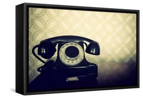 Vintage Old Telephone, Black Retro Phone Is On Wooden Table Over Green Old-Fashioned Wallpaper-khorzhevska-Framed Stretched Canvas