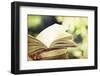 Vintage Photo of Old Books on Colorful Bokeh Background-melis-Framed Photographic Print