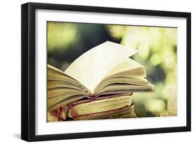 Vintage Photo of Old Books on Colorful Bokeh Background-melis-Framed Photographic Print