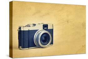 Vintage Rangefinder Style Camera on a Textured Background with Space for Text-Kamira-Stretched Canvas
