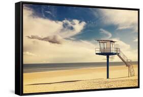 Vintage Retro Style Filtered Picture of a Lifeguard Tower on a Beach.-Maciej Bledowski-Framed Stretched Canvas