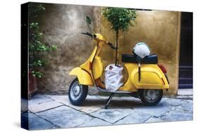 Vintage Sccooter With a Small Tree Parked along a House, Pienza, Tuscany, Italy-George Oze-Stretched Canvas