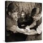 Vintage Shot of a Man Being Tattooed-null-Stretched Canvas