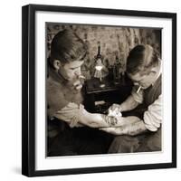 Vintage Shot of a Man Being Tattooed-null-Framed Photographic Print