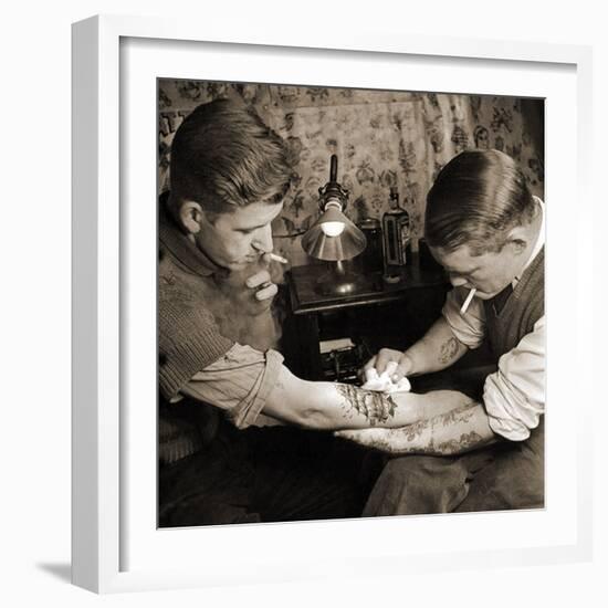 Vintage Shot of a Man Being Tattooed-null-Framed Photographic Print
