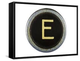 Vintage Typewriter Letter E Isolated On White-Steve Collender-Framed Stretched Canvas