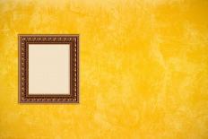 Grunge Yellow or Gold Stucco Wall with Empty Picture Frame-Virtuelle-Framed Stretched Canvas