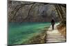 Visitor on Wooden Walkway Path over Crystal Clear Waters of Plitvice Lakes National Park-Simon Montgomery-Mounted Photographic Print