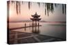 Visitors are Taking the Last Shots with a Pagoda at West Lake as the Sun Is Sinking-Andreas Brandl-Stretched Canvas