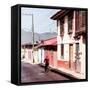 ¡Viva Mexico! Square Collection - Red Cyclist in the street of San Cristobal III-Philippe Hugonnard-Framed Stretched Canvas