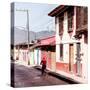 ¡Viva Mexico! Square Collection - Red Cyclist in the street of San Cristobal III-Philippe Hugonnard-Stretched Canvas