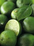 Limes, Several Whole and One Halved-Vladimir Shulevsky-Photographic Print