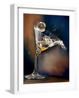 Vodka Martini Spilling from a Bent Martini Glass with Ice Cube-Jeff Sarpa-Framed Photographic Print