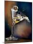 Vodka Martini Spilling from a Bent Martini Glass with Ice Cube-Jeff Sarpa-Mounted Photographic Print