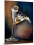 Vodka Martini Spilling from a Bent Martini Glass with Ice Cube-Jeff Sarpa-Mounted Photographic Print