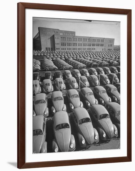 Volkswagen Factory Rolls an Average of 150 Efficient 4 Cylinder Sedans Into Storage Yards Every Day-Walter Sanders-Framed Photographic Print