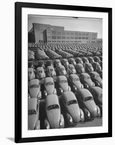 Volkswagen Factory Rolls an Average of 150 Efficient 4 Cylinder Sedans Into Storage Yards Every Day-Walter Sanders-Framed Photographic Print