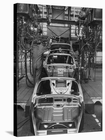 Volkswagen Plant Assembly Line-James Whitmore-Stretched Canvas