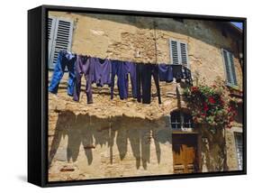 Volterra, Tuscany, Italy. Washing Hanging on a Line-Fraser Hall-Framed Stretched Canvas