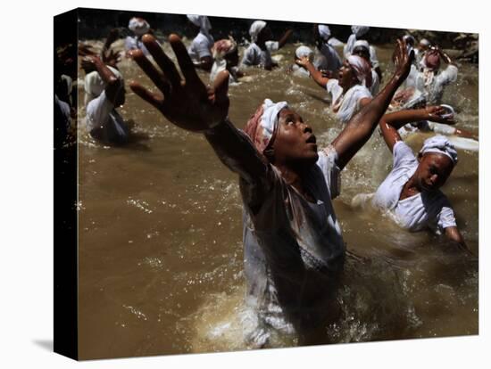 Voodoo Believers Perform a Ceremony at a Sacred Pool in Souvenance, Haiti-null-Stretched Canvas