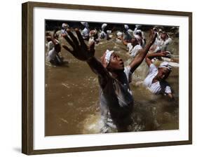 Voodoo Believers Perform a Ceremony at a Sacred Pool in Souvenance, Haiti-null-Framed Photographic Print