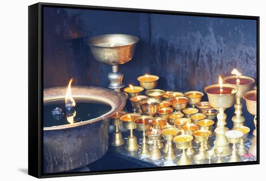 Votive candles, Boudhanath Stupa, UNESCO World Heritage Site, Kathmandu, Nepal, Asia-G&M Therin-Weise-Framed Stretched Canvas
