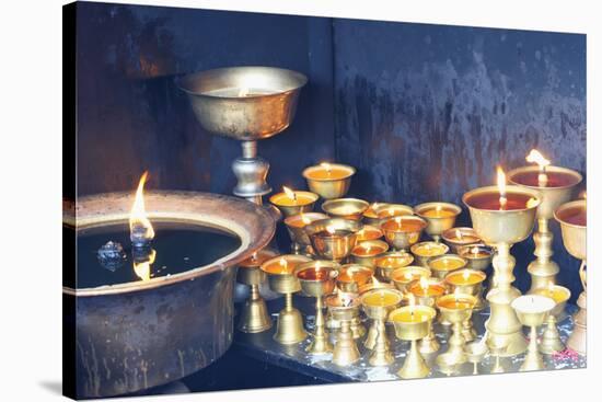 Votive candles, Boudhanath Stupa, UNESCO World Heritage Site, Kathmandu, Nepal, Asia-G&M Therin-Weise-Stretched Canvas